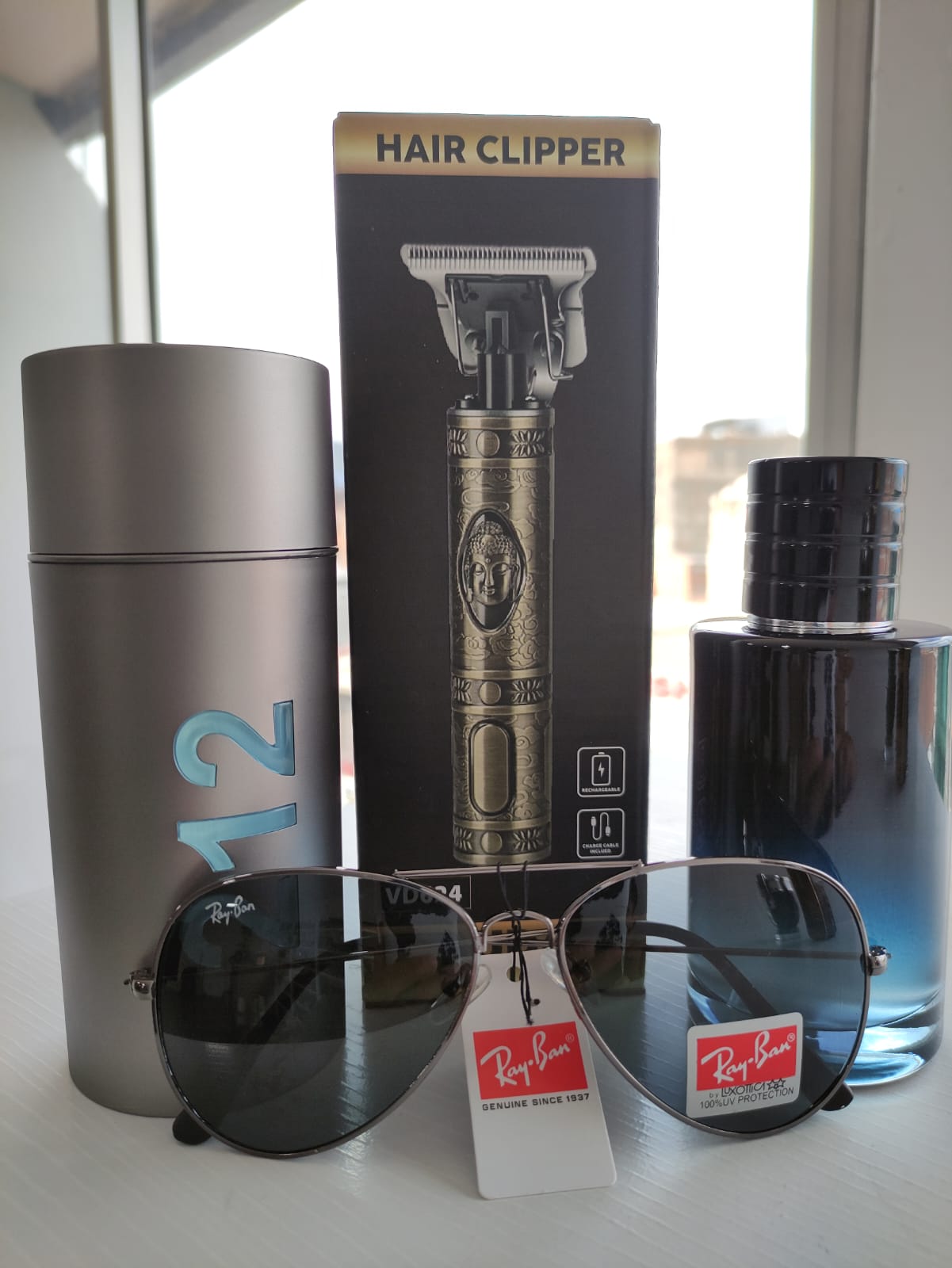 KIT 122 (2 PERFUMES+AFEITADORA+GAFAS)